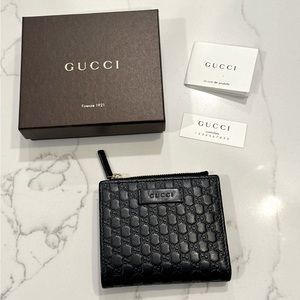 New Gucci black micro GG Guccissima bifold wallet